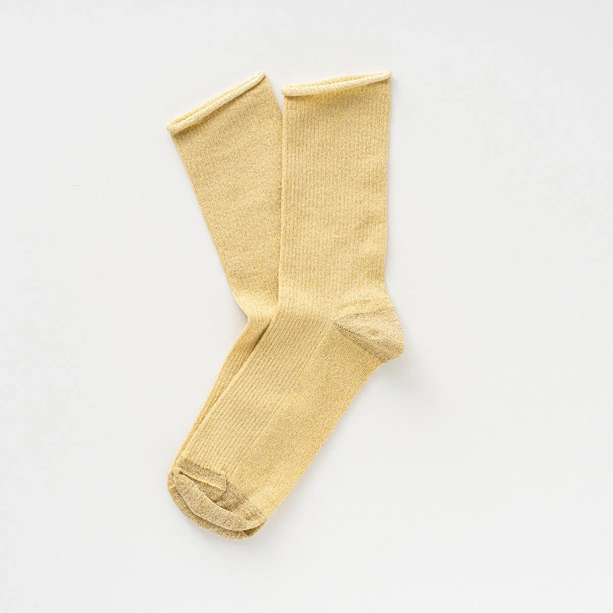 Zitronengelbe KLUE Glitzersocken Lemon aus Lyocell mit feinem Metallic-Schimmer und umgeschlagenem Abschluss.