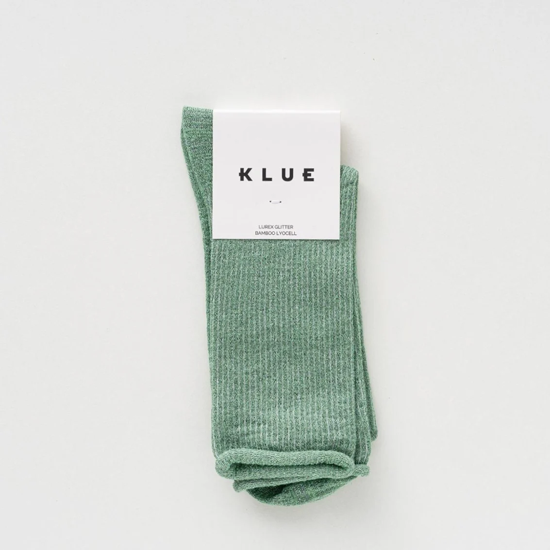 Mintgrüne KLUE Glitzersocken aus Lyocell mit feinem Metallic-Schimmer und umgeschlagenem Abschluss in Größe 36–40.