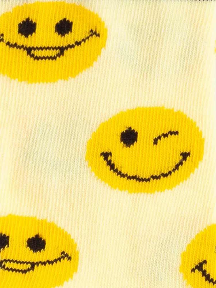 Bunte Kindersocken mit Smiley-Motiv „Lil Sunny Smileys“ aus Bio-Baumwolle von Dilly Socks, nachhaltig & fair produziert in der Türkei.